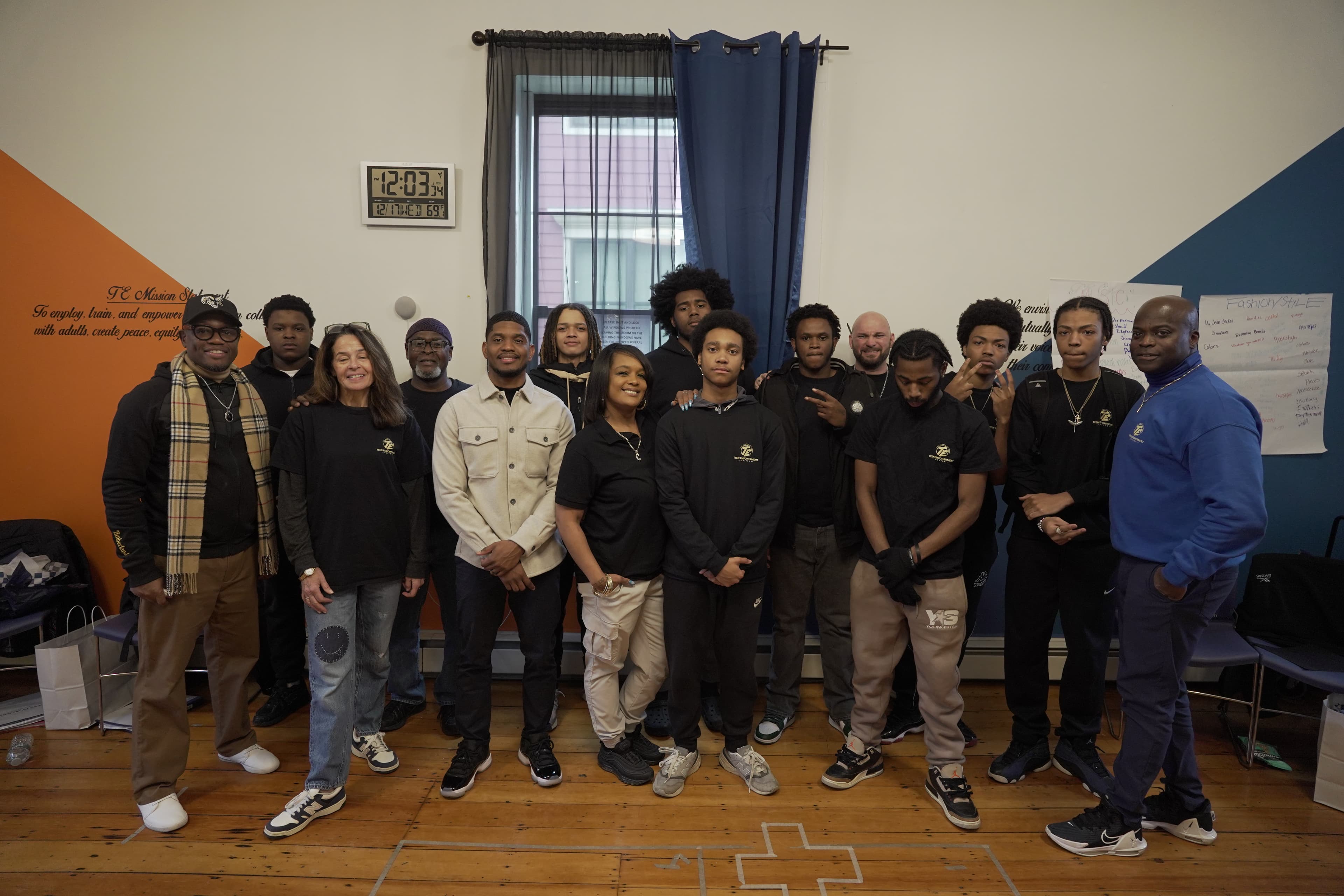 The REBELS team and cohort members posing together after a program session