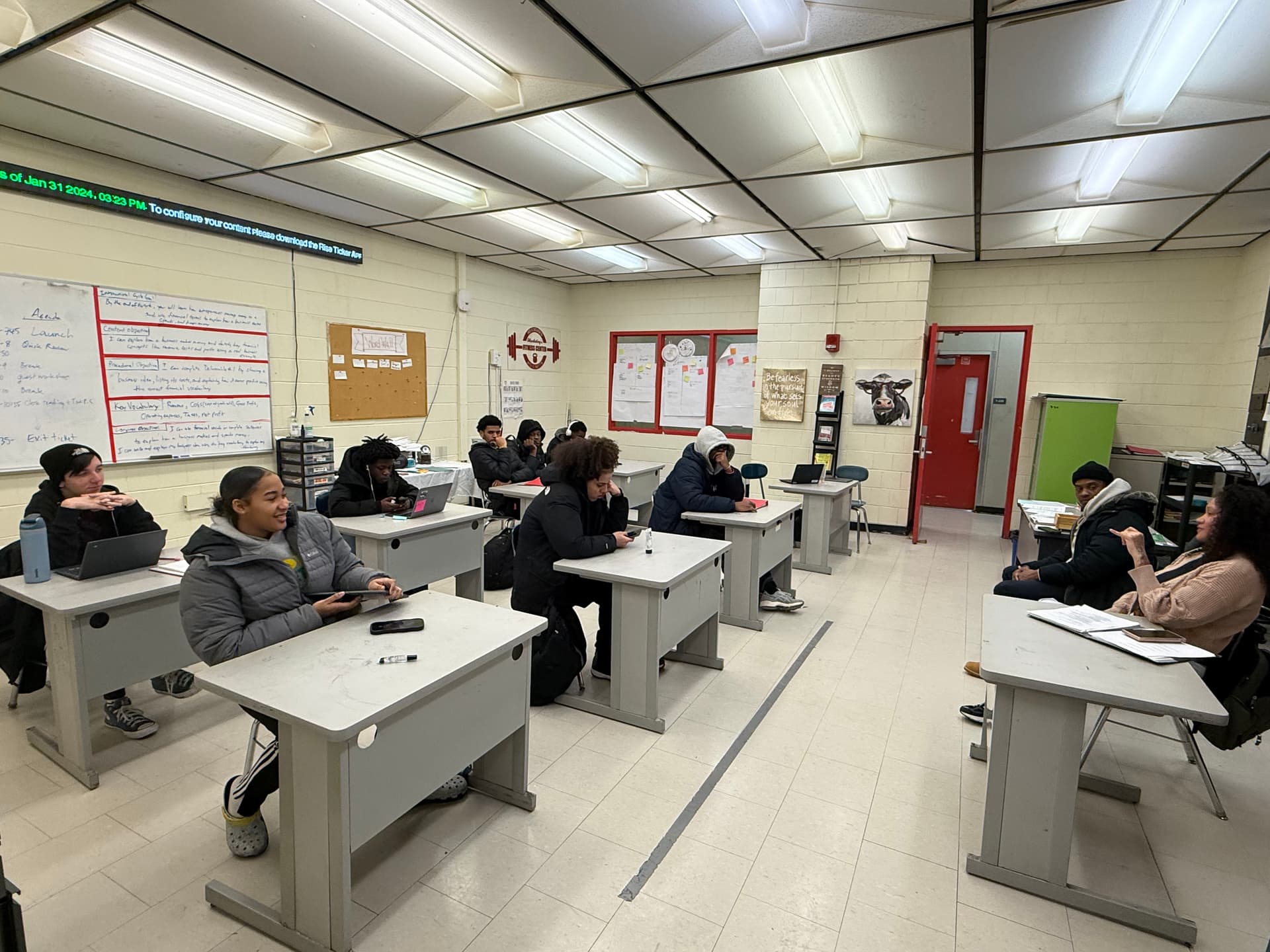 A REBELS cohort in session at their desks